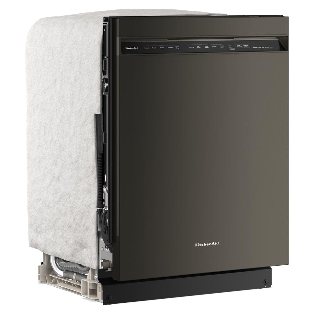 Black freestanding dishwasher with digital controls partially covered in protective insulation from KitchenAid appliances collection