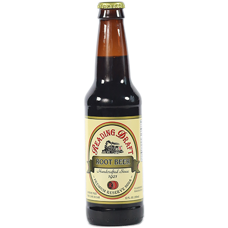 Brown glass bottle of premium Reading Draft root beer with cream-colored label and gold bottle cap