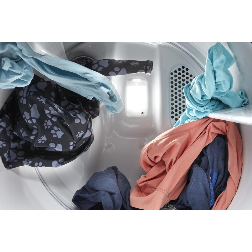 Interior view of a top load electric dryer drum with mixed colorful laundry from Dryers collection