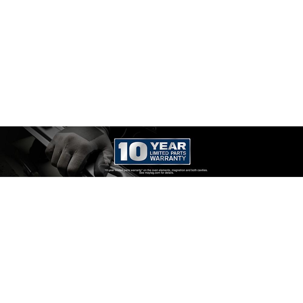 Close-up of hand gripping stainless steel oven handle with badge highlighting 10-year limited parts warranty on black background