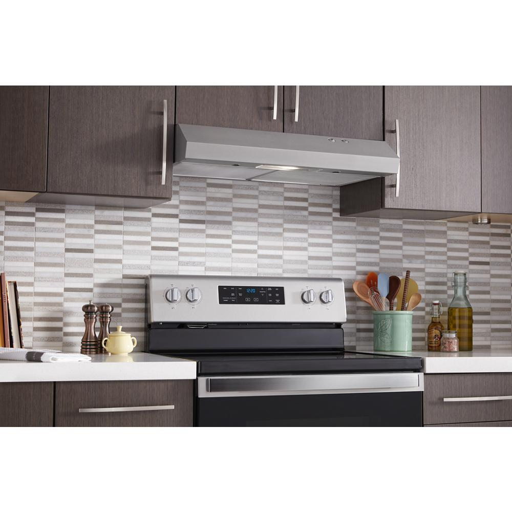 Under cabinet 30-inch range hood with full-width grease filters and LED lighting in modern kitchen appliances collection