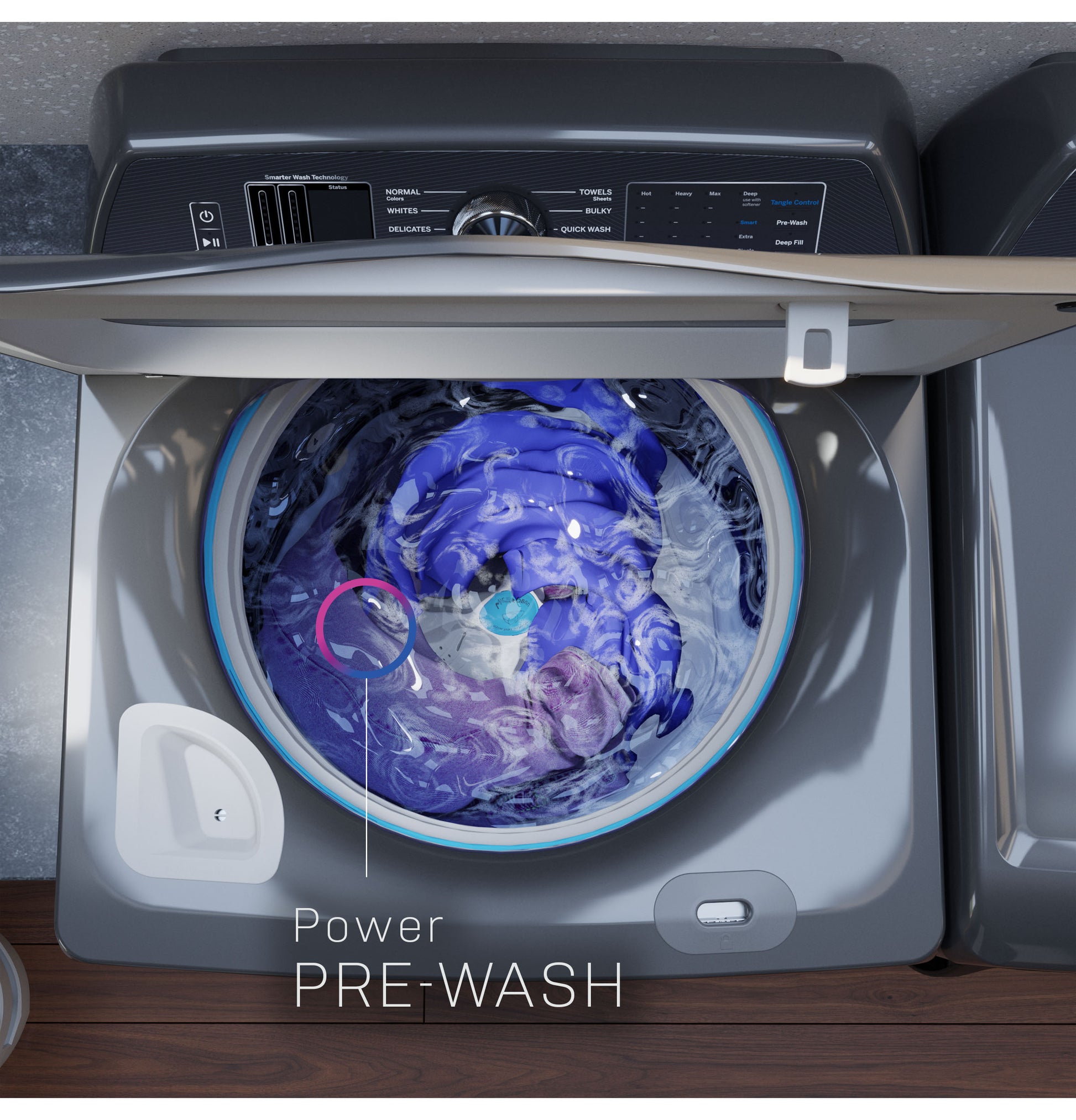 Top load washer with open lid showing swirling water and Power Pre-Wash setting on control panel in laundry space