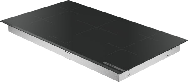 Sleek black induction cooktop with four cooking zones, designed for modern kitchens in cooktops and appliances collections