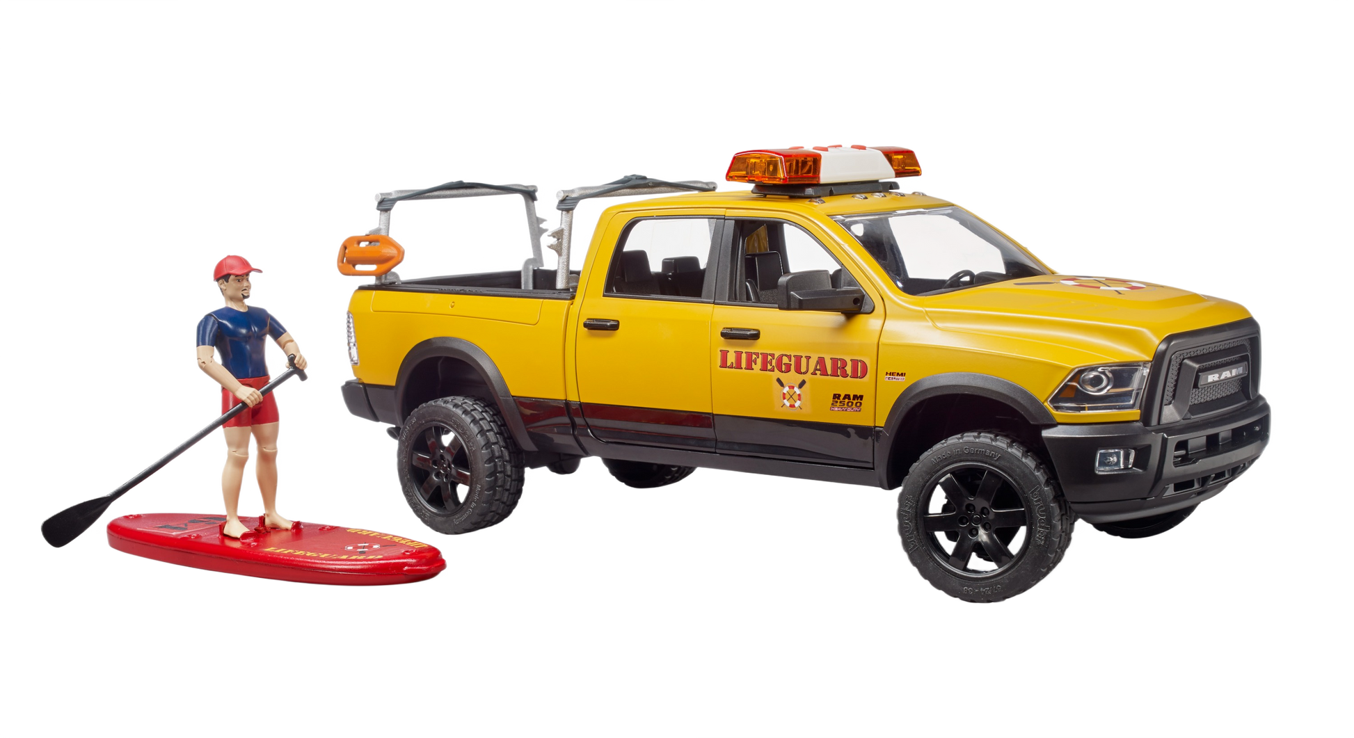Yellow rescue pickup truck with lifeguard markings and figure with paddleboard in Bruder Toys collection