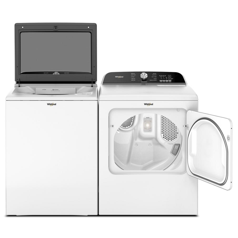White Whirlpool top load washer next to a 7.0 cu. ft. top load gas dryer with open door in laundry appliance set