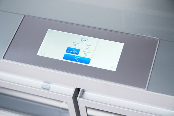 Close-up of digital control panel on stainless steel built-in French door bottom freezer refrigerator displaying temperature settings