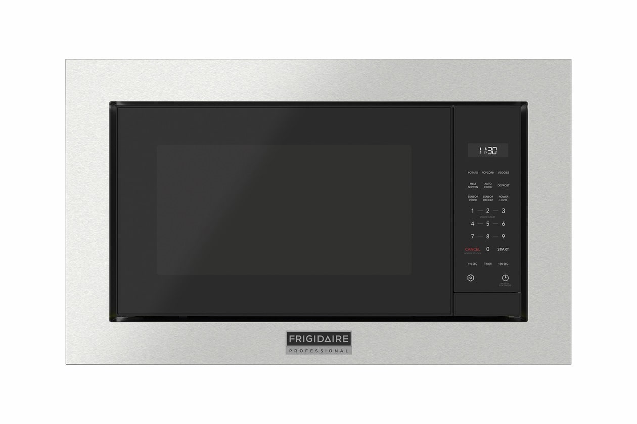 Built-in microwave with smooth stainless steel trim kit and digital control panel in modern kitchen setting
