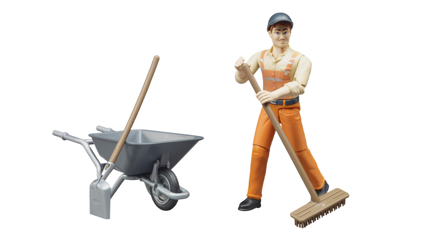 Figure of municipal worker in orange overalls sweeping with push broom next to gray wheelbarrow and shovel for home improvement tasks