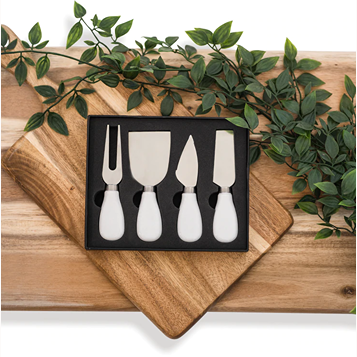 Four-piece cheese knife set with stainless steel blades and white ceramic handles in kitchen utensils and cookware collections