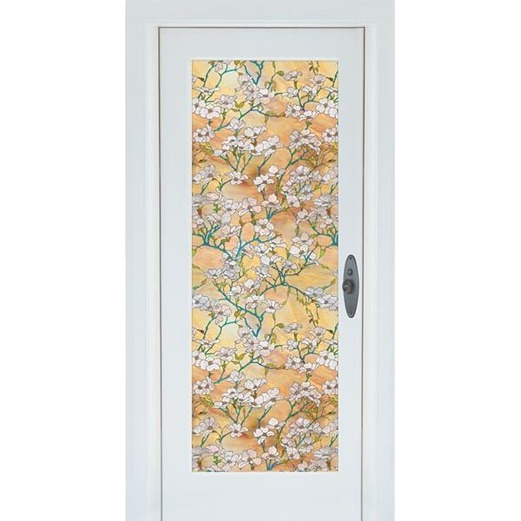 Door with decorative dogwood floral privacy film featuring white blossoms and green branches on warm background