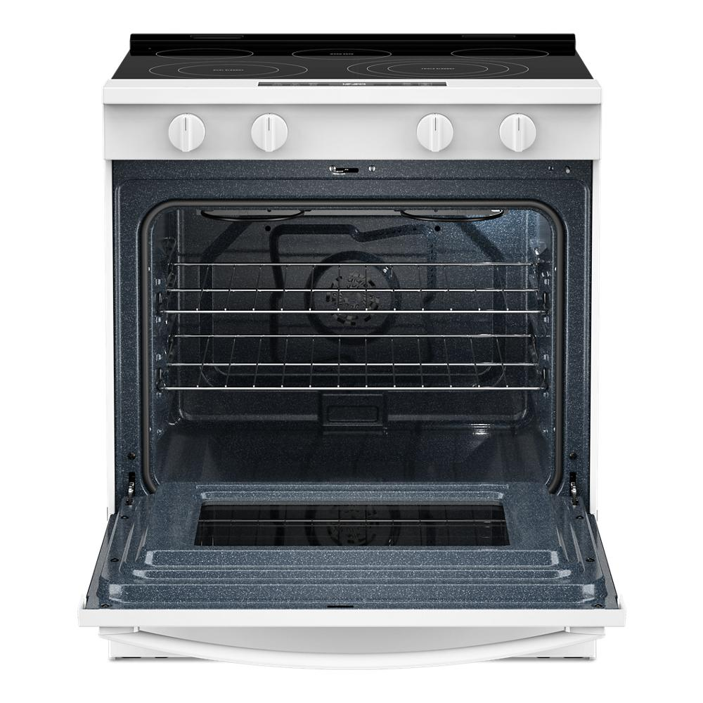 Open white electric range with smooth cooktop and empty oven cavity featuring two wire racks from kitchen appliances collection