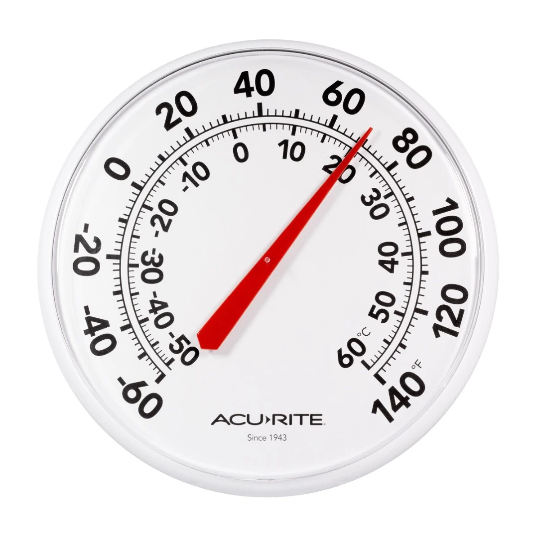 Round AcuRite thermometer showing temperature in Fahrenheit and Celsius for home improvement use