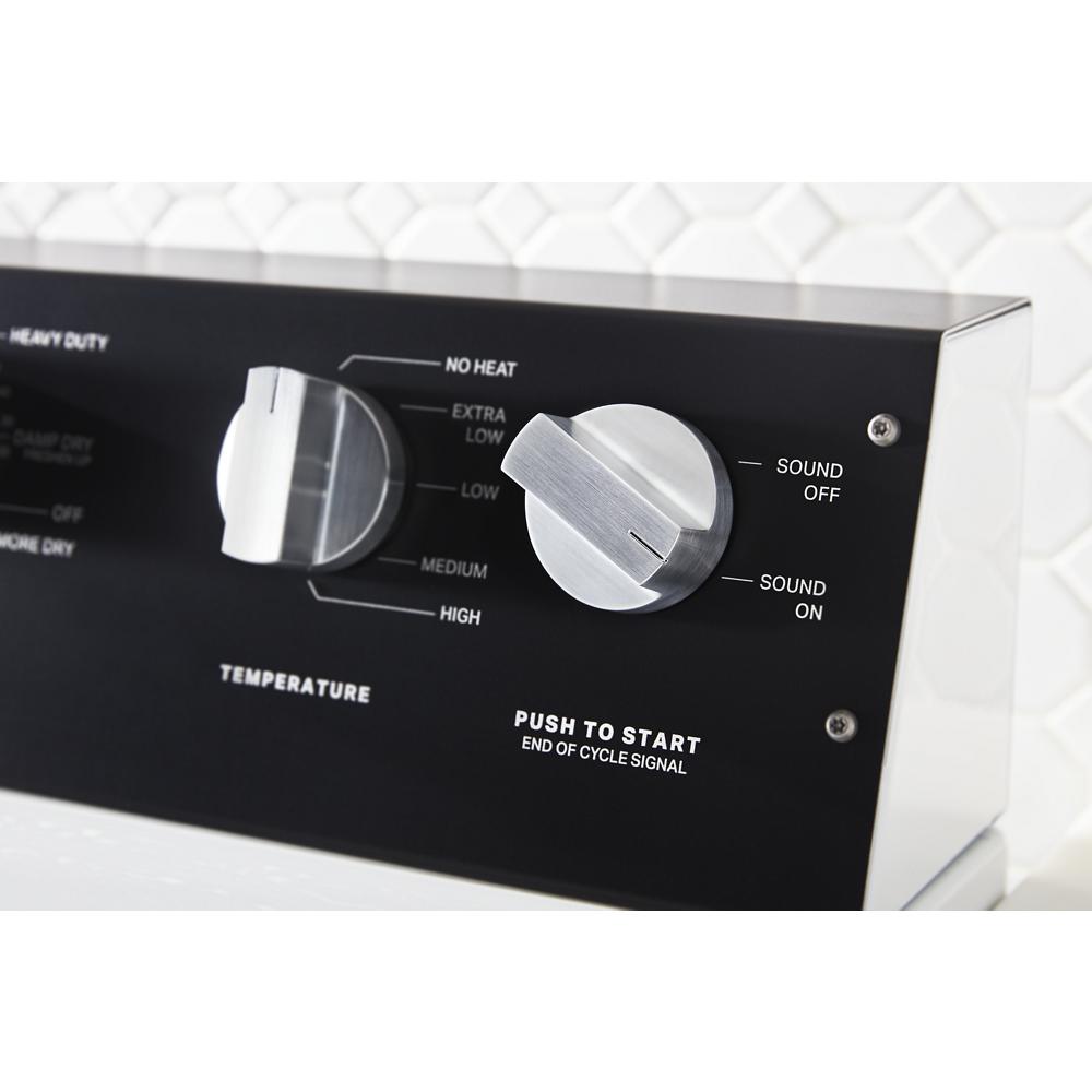 Close-up of black control panel with temperature and sound dials on commercial-grade residential electric dryer