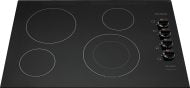 Black electric cooktop with four burners and rotary control knobs in kitchen appliance and cooktop collection