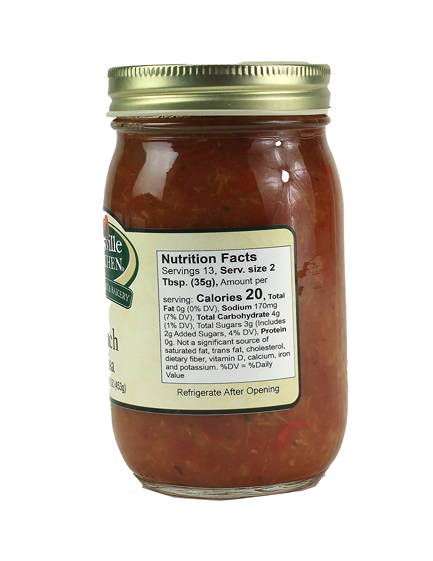Hartville Kitchen Peach Salsa in a clear glass jar with a gold metal lid from the Food & Beverage collection under $50