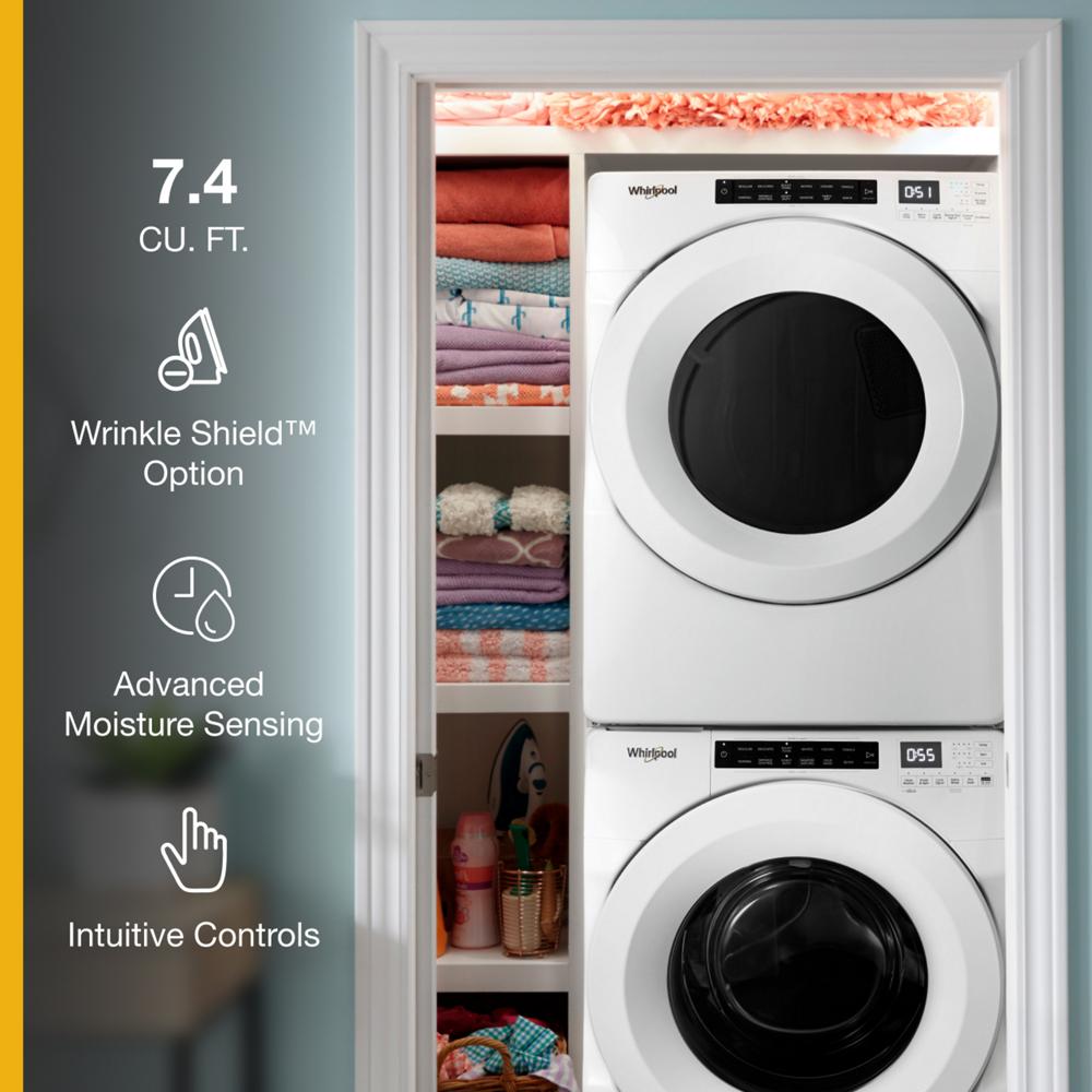 Stacked white front load electric dryer and washer with digital control panels in a home laundry closet setting for appliances collection