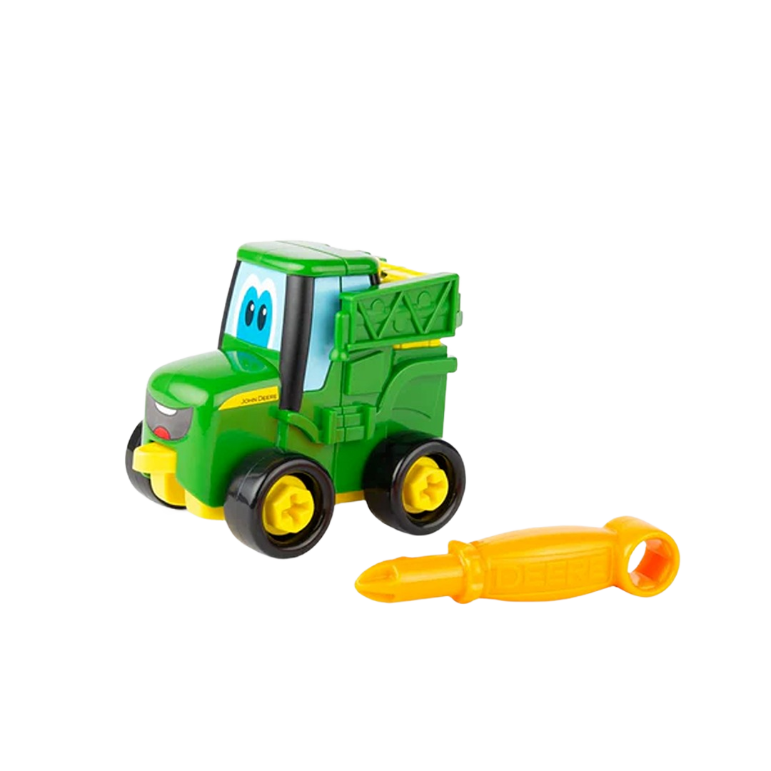 Green toy sprayer truck with smiling face and yellow detachable tool for kids’ build-and-play fun