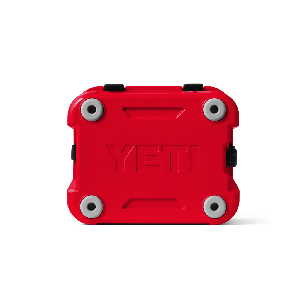 Red durable YETI Roadie 24 2.0 hard cooler with protective feet for food storage and organization collections