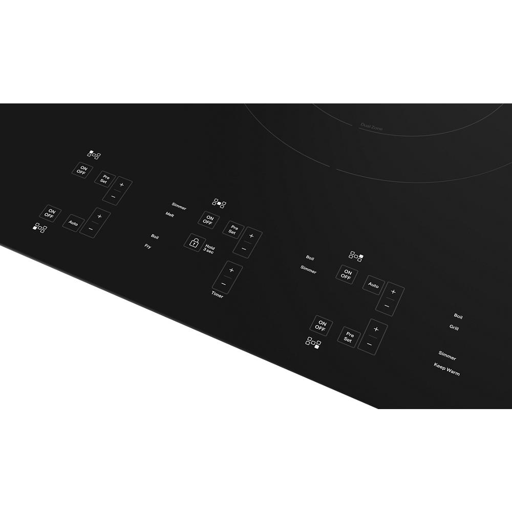 Black 36-inch sensor induction cooktop with five cooking zones and digital touch controls from KitchenAid Appliances collection