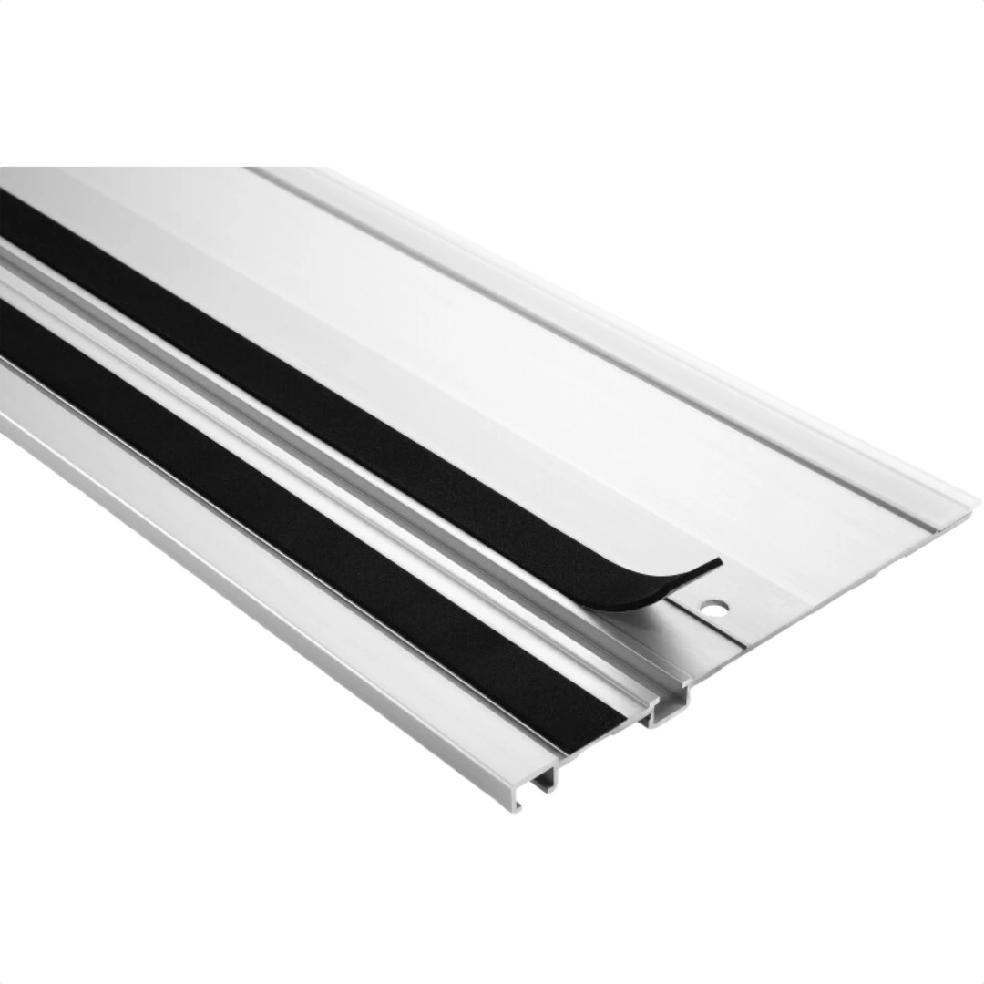 Black adhesive non-skid strip applied to aluminum guide rail for woodworking tool accessories and saw tracks collection