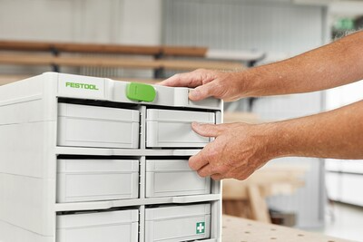 White Festool Systainer3 storage rack with six compartments for organizing small Systainers in workshop tool storage systems