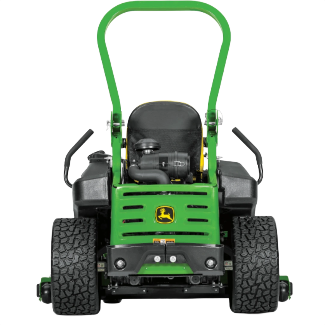 Rear view of green and yellow zero-turn mower featuring Mulch On Demand deck and durable Tweel tires for home improvement tasks