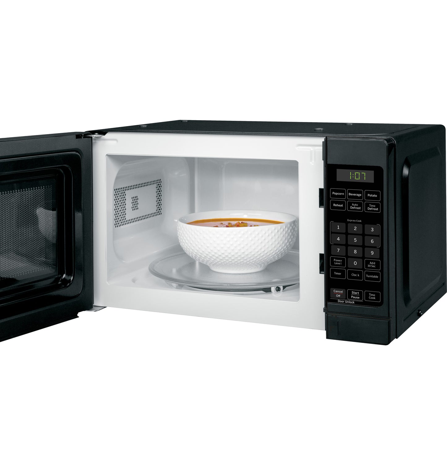 Black countertop microwave with open door, digital keypad, and white bowl of soup inside from Countertop Microwaves collection