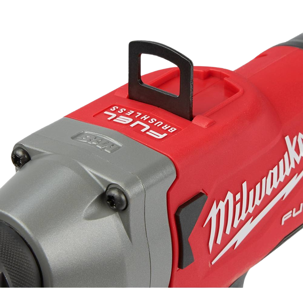 Close-up of a red and gray Milwaukee cordless blind rivet tool with brushless motor and ergonomic design for home improvement.