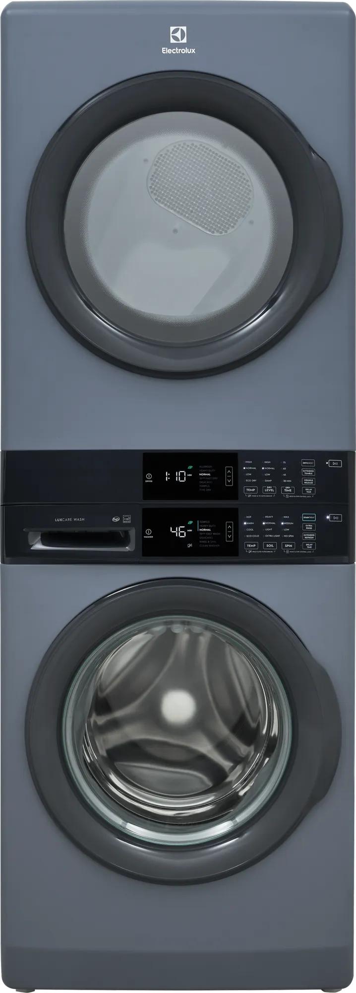 Stacked front load washer and electric dryer unit in gray with digital control panels and clear circular doors, part of appliance laundry centers at Hartville Hardware.
