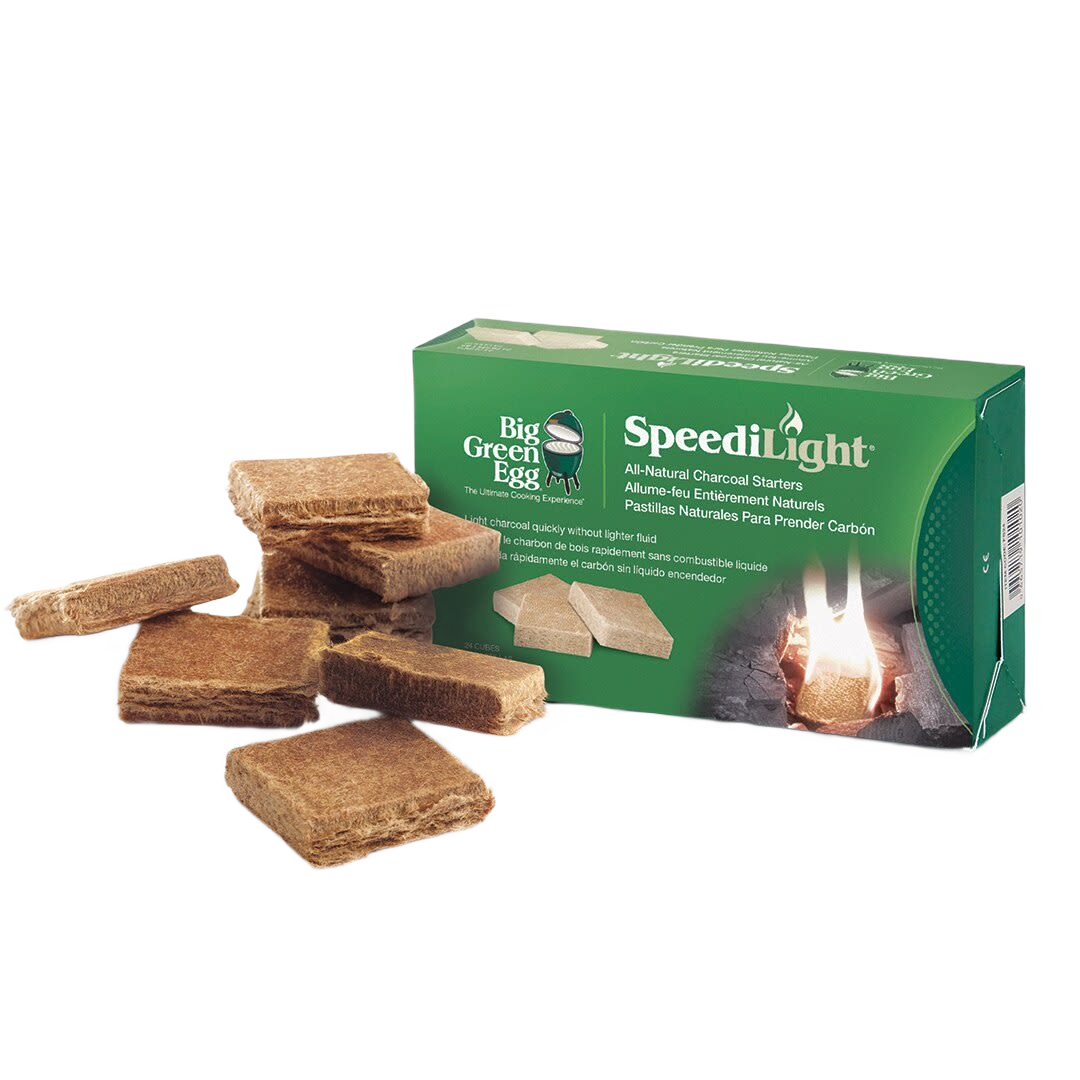 Green packaging of natural charcoal starters with brown compressed fire-starting squares for grilling accessories use
