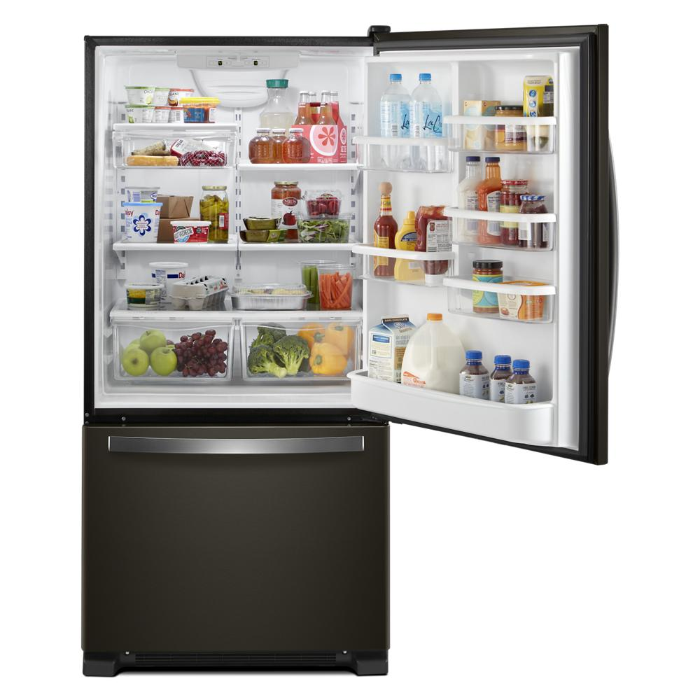 Open matte black bottom-freezer refrigerator showing neatly organized fresh produce, beverages, and dairy in spacious compartments.