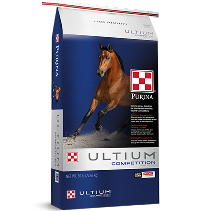 Blue and white bag of Purina Ultium Competition horse feed featuring a running brown horse illustration on the front.