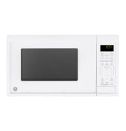 White countertop microwave oven with digital keypad and LED display in kitchen appliances and microwaves collection