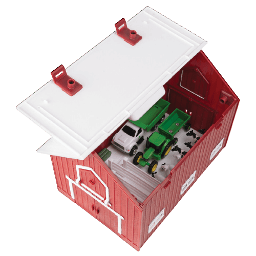 Red plastic barn toy with hinged white roof containing miniature green tractor, truck, and farm animals in 1/64 scale set