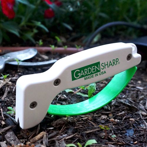 Green and white handheld sharpener for gardening and woodworking tools in home improvement and sharpeners collections under $50