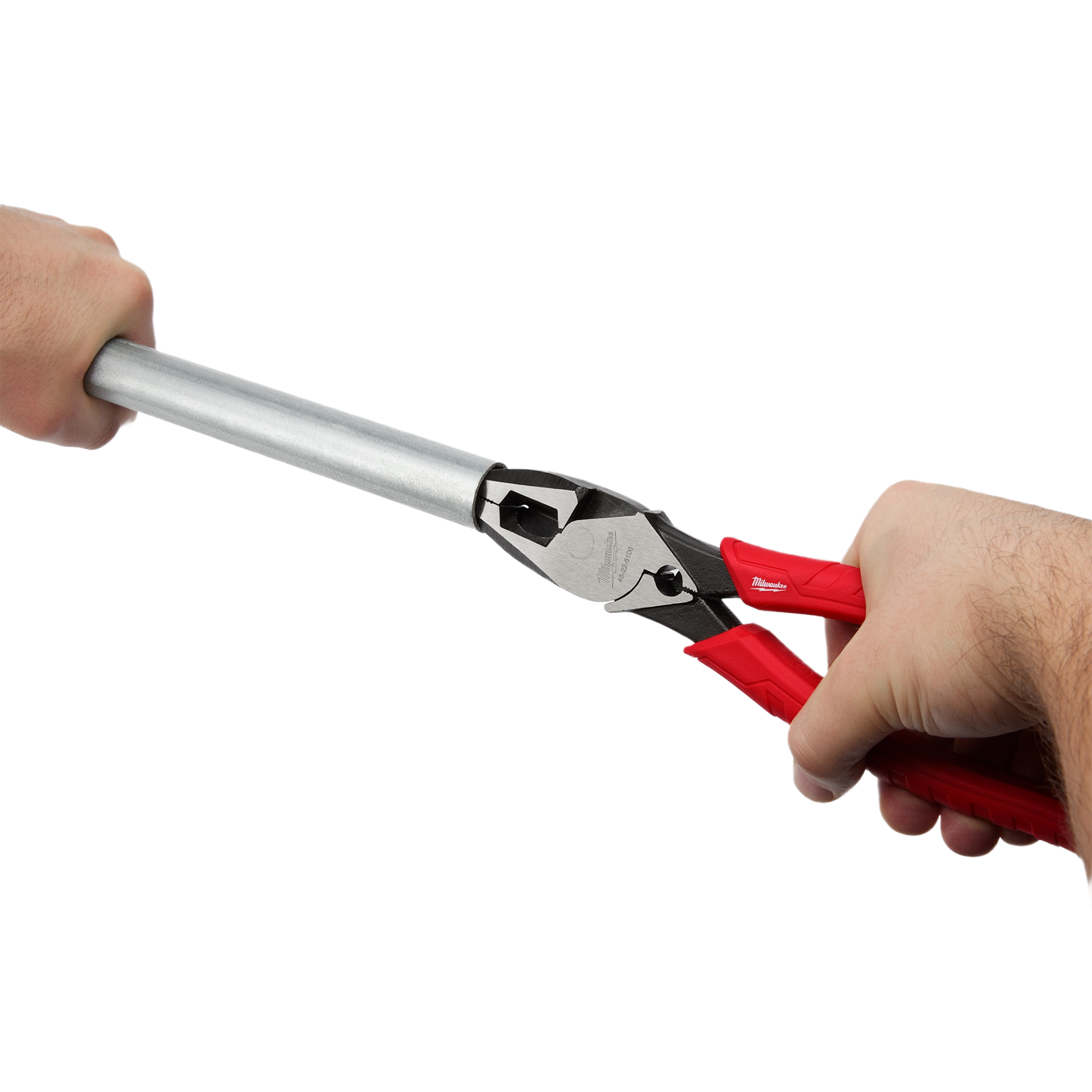 Red comfort grip lineman’s pliers with crimper cutting a metal pipe for home improvement and woodworking tools collections