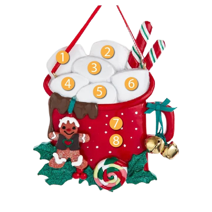 Red mug ornament with marshmallows, candy canes, gingerbread figure, holly leaves, and jingle bells decoration