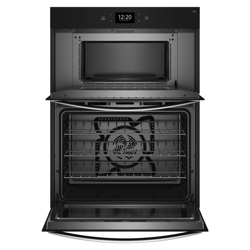 Stainless steel wall oven microwave combo with open doors showing oven racks and digital control display in kitchen appliances collection