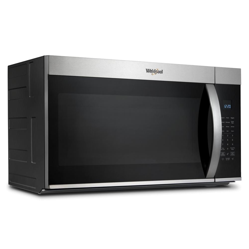 Stainless steel countertop microwave with digital control panel and curved handle in kitchen appliances collection