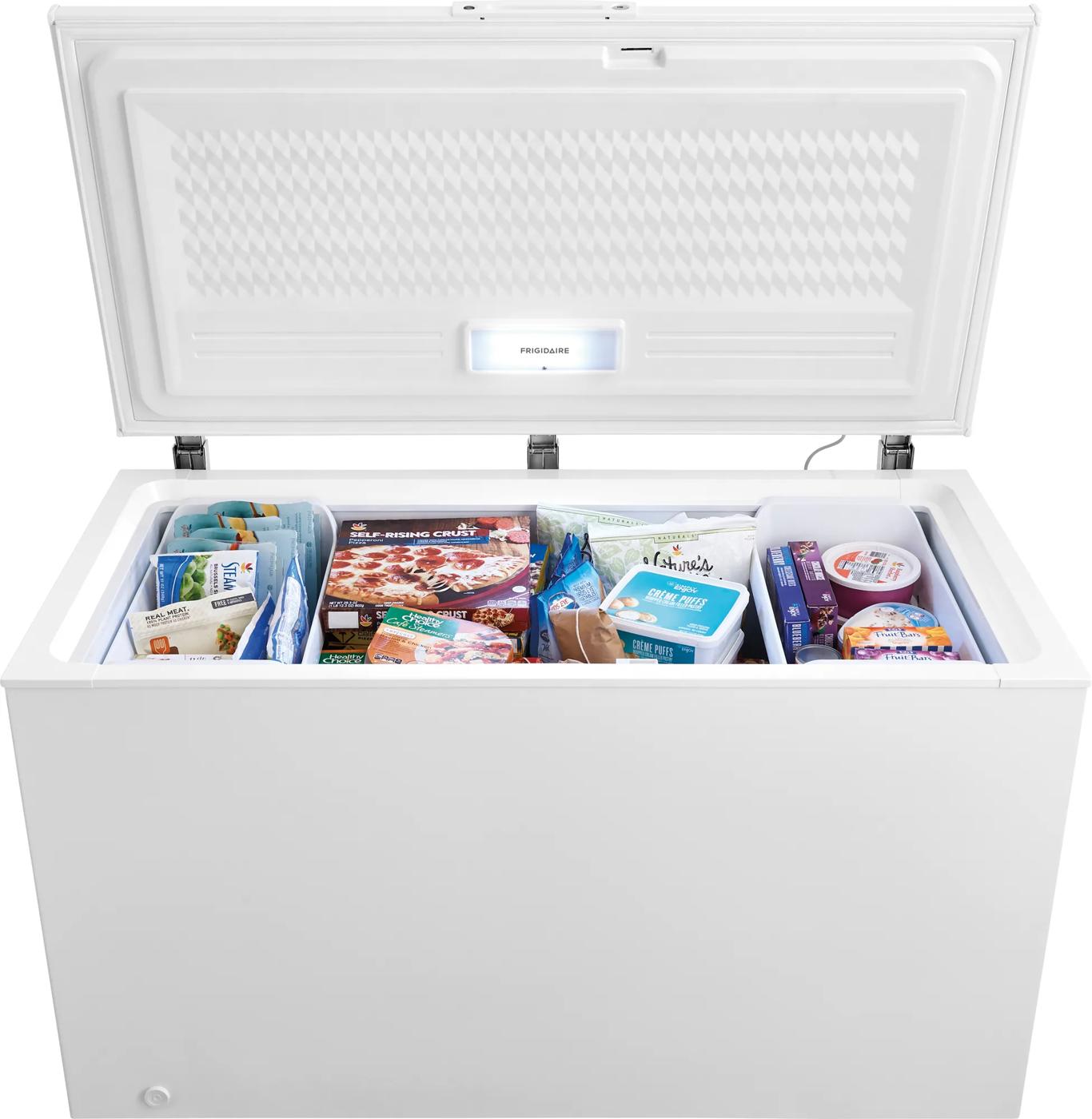 White garage-ready chest freezer open with removable baskets and frozen food inside in appliances and kitchenware collections