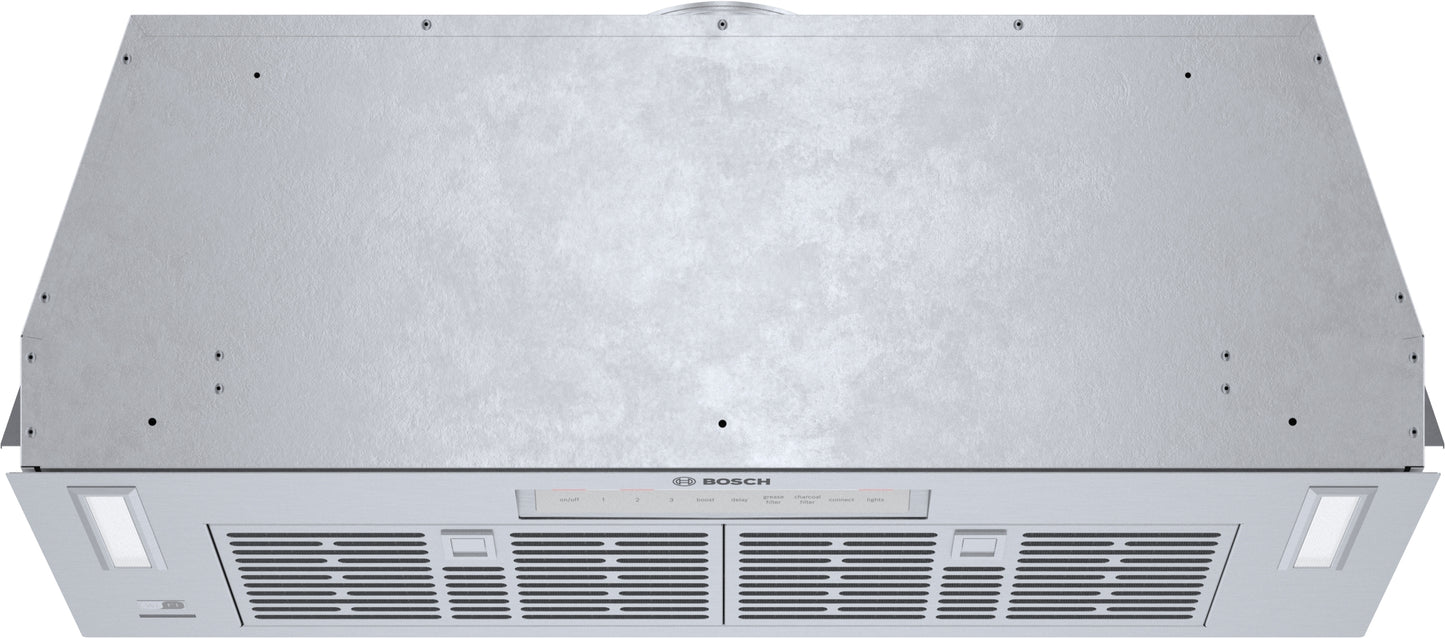 Stainless steel custom insert for over the range hoods with mesh filters and integrated lighting from Bosch appliances collection