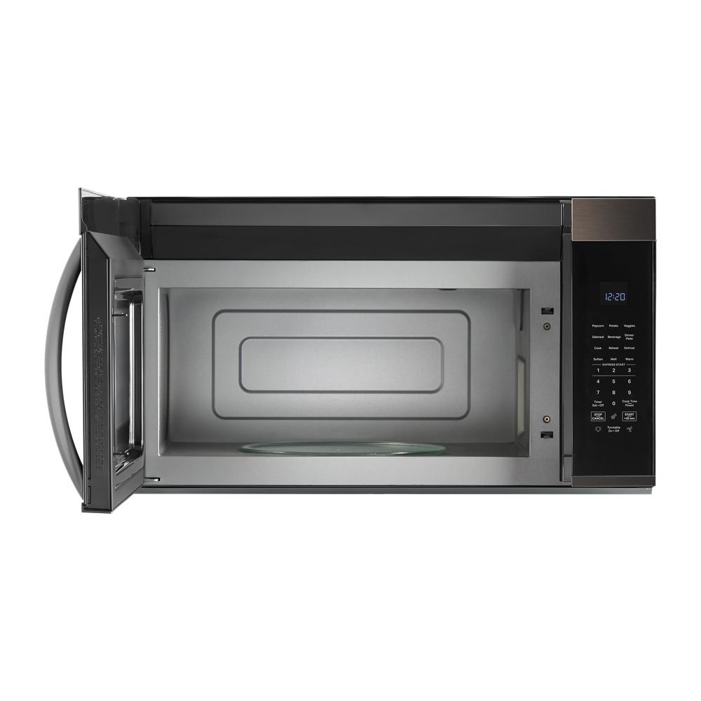 Open stainless steel interior of a 30-inch wide over the range microwave with digital touch controls in Microwaves at Hartville Hardware