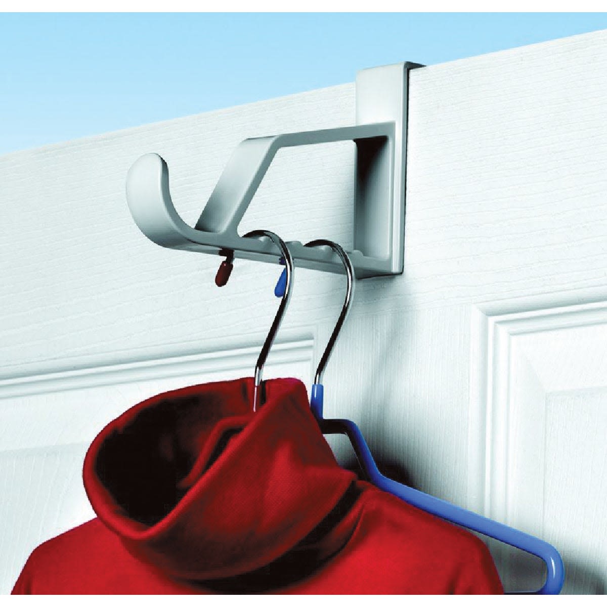 White over-the-door hanger made of durable plastic holding multiple clothes hangers for storage organization