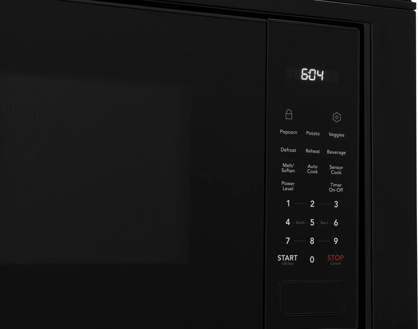 Black microwave oven control panel with digital display and touchpad buttons for cooking settings in Kitchen & Kitchenware collection