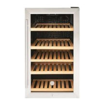 Compact beverage cooler with a white frame, clear glass door, and multiple wooden slatted shelves for organized bottle storage in a home setting.