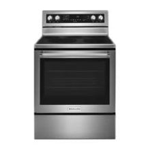 Front view of a stainless steel electric range with black glass oven door, digital control panel, and four burner elements for home cooking.