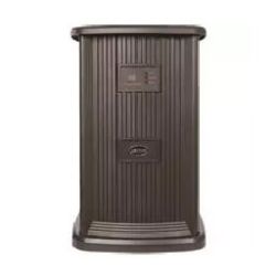 Tall dark brown humidifier with vertical ridged texture, rectangular digital display near the top, and a vented base for airflow.