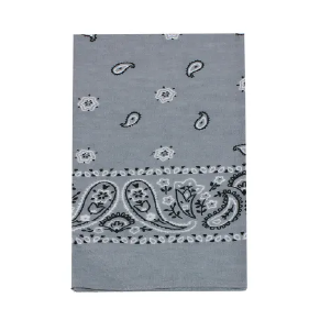 Light gray fabric featuring a classic paisley and floral pattern in black and white with a decorative border design near the edge.