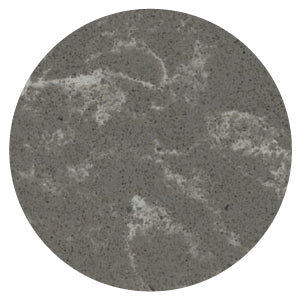 Circular surface sample displaying dark gray concrete texture with subtle white marble-like veining and a smooth finish.