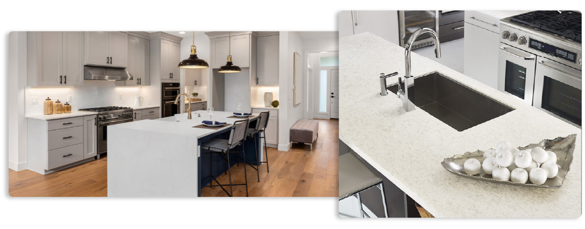 Spacious contemporary kitchen featuring a large white stone island with seating, stainless steel appliances, gray cabinetry, and wood flooring.